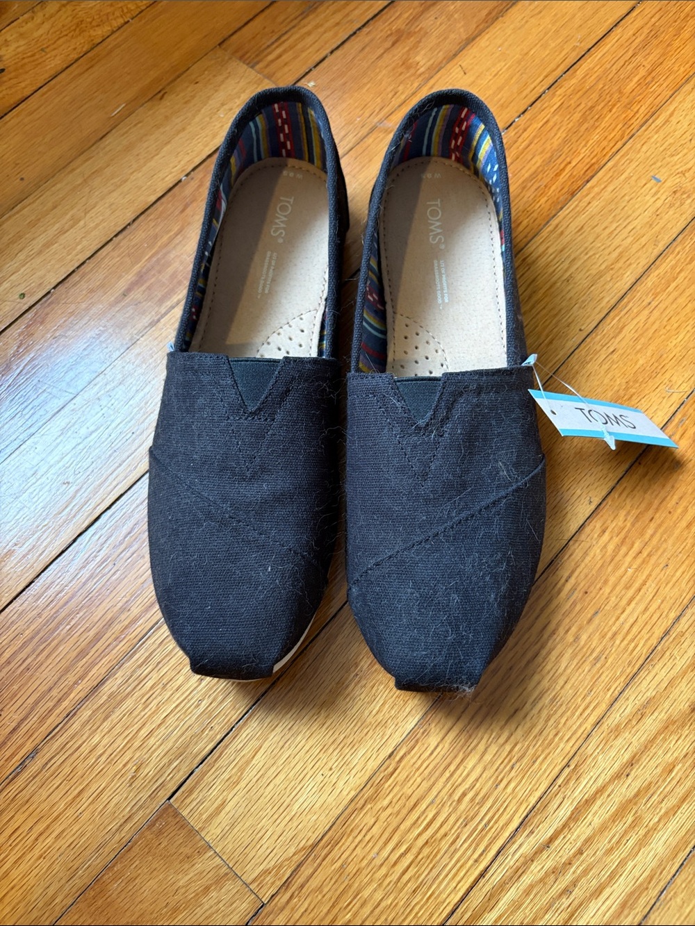 TOMS Black Canvas wonen’s Slip-On Loafers
